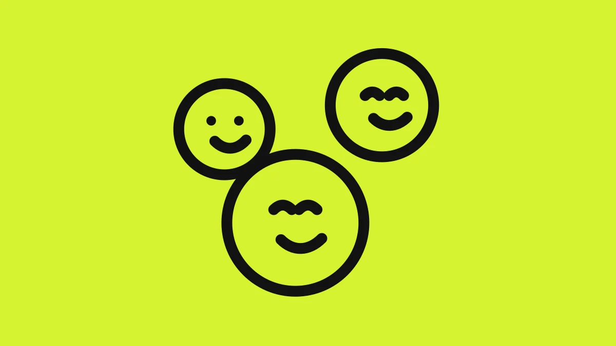 An icon of three smiling faces on a bright green background